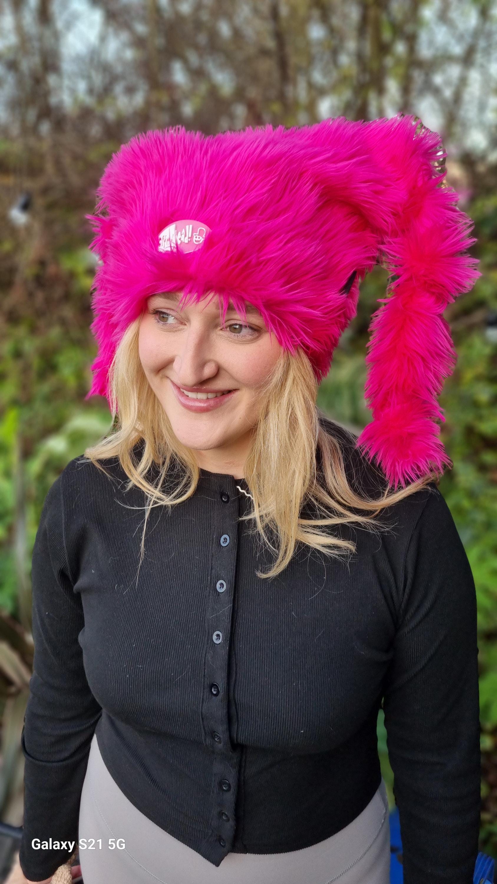 Fluffy shocking pink faux fur rave hat with polar fleece lining
