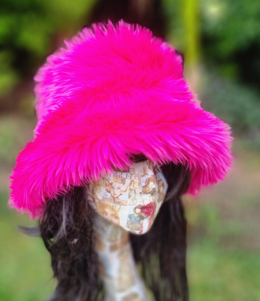 Shaggy shocking pink faux fur bucket hat — side view showing curly faux fur texture and floppy brim, handmade by Off My Head