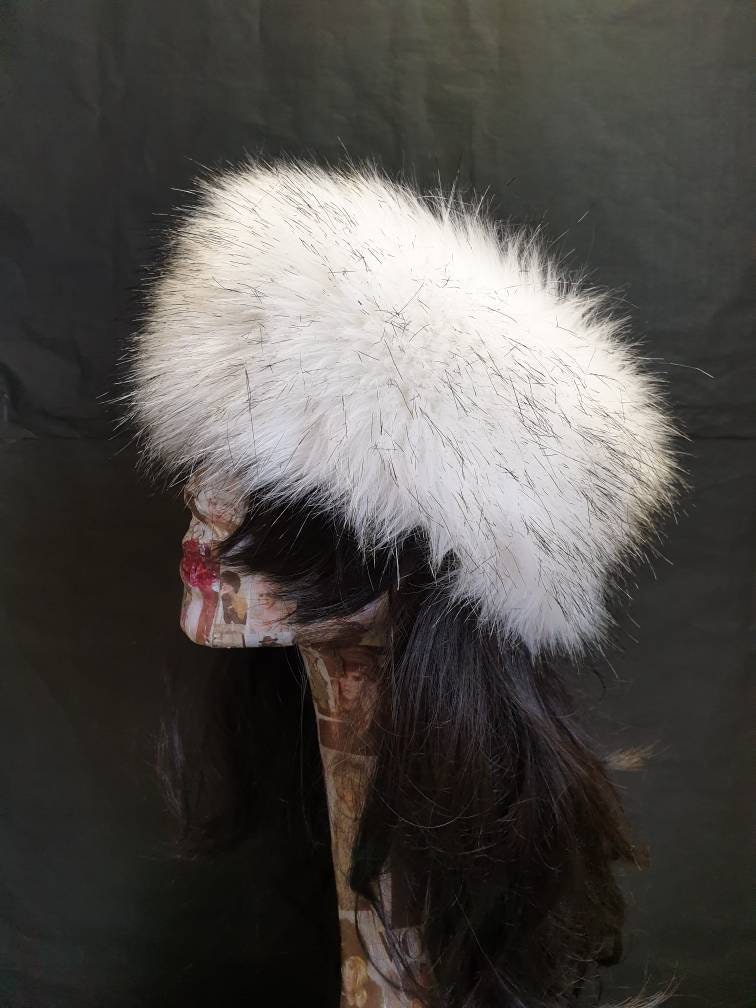 White and black tips husky-inspired faux fur headband worn as ear warmer, side profile