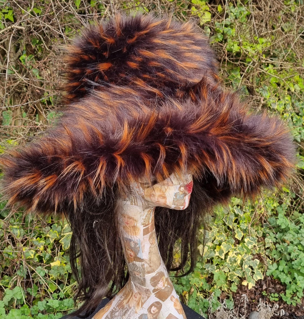 Wide brim brown and orange faux fur bucket hat, three-quarter view showing brim structure