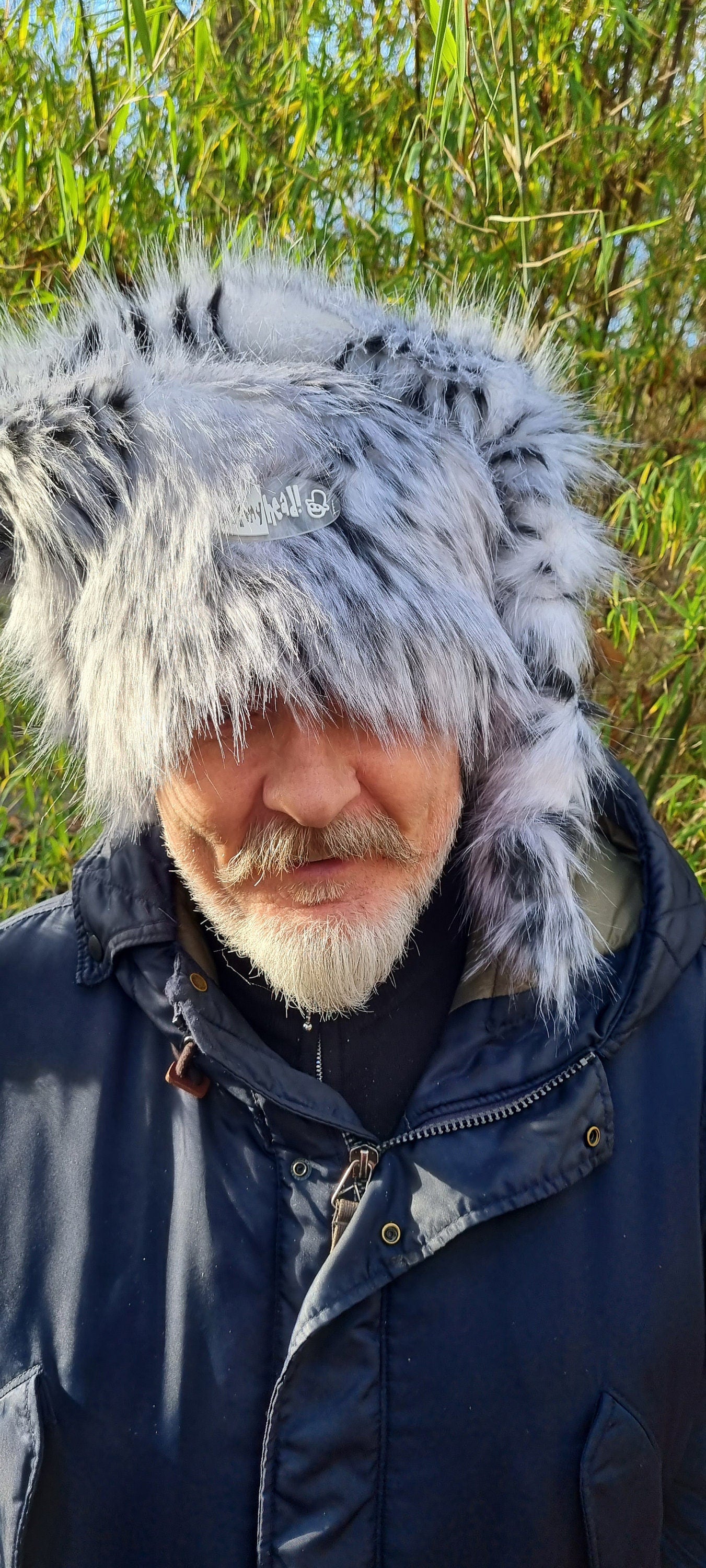 big furry off my head hat black white