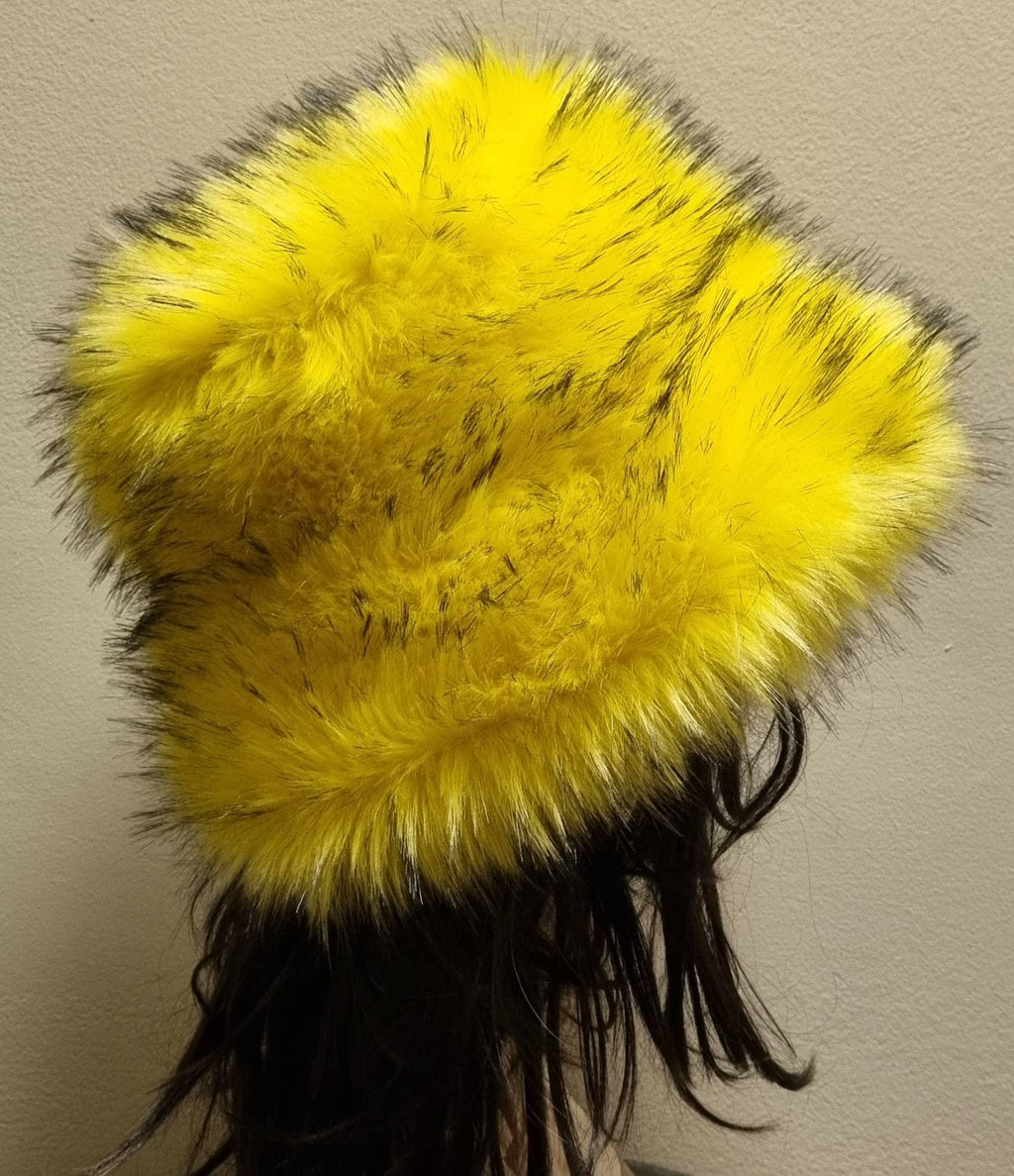Canary yellow faux fur bucket hat — second side angle on mannequin highlighting luxury faux fur texture