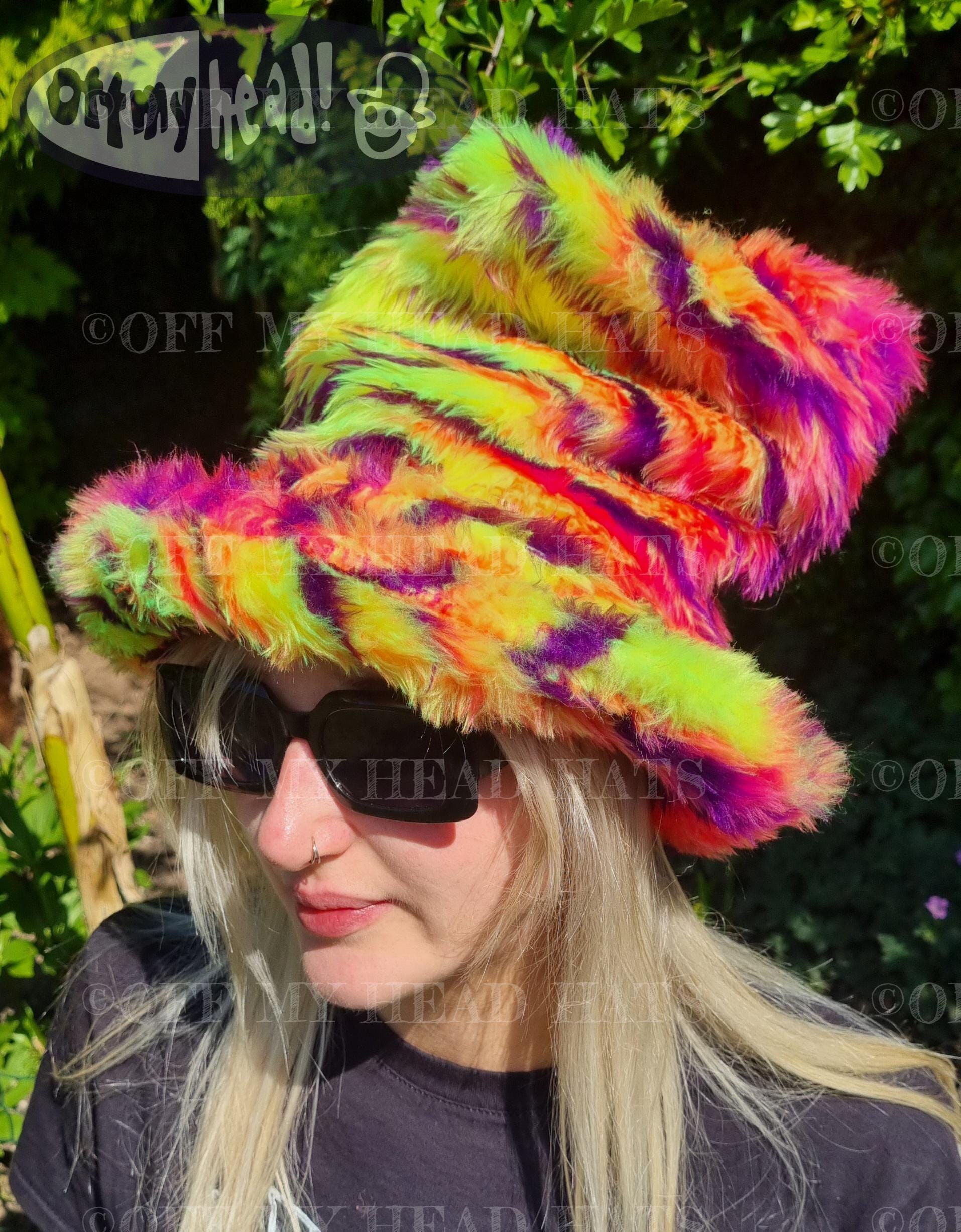 tall fake fur hat in a tiger print multicoloured fabric