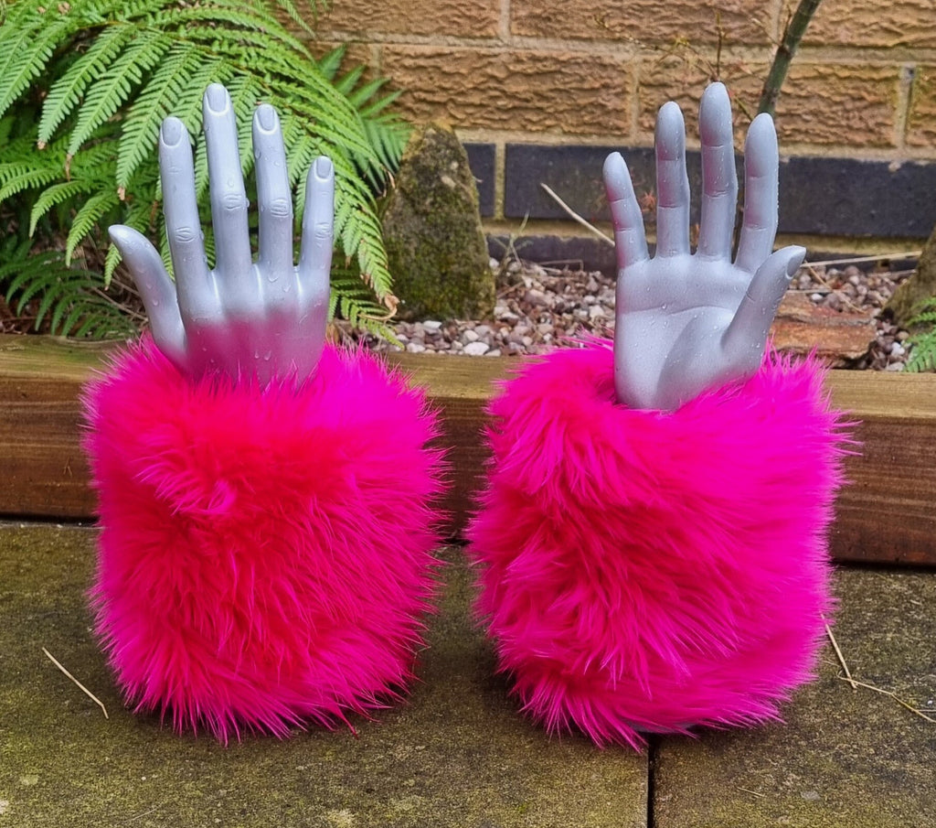 fluffy pink wrist cuffs in a soft faux fur fabric