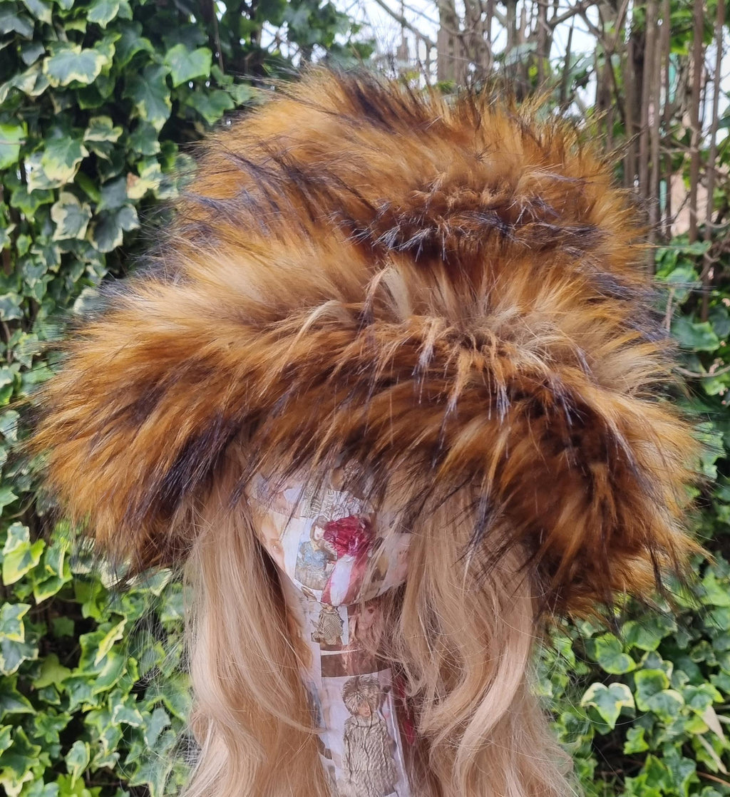 Foxy faux fur bucket hat — close front view highlighting rich ginger, copper and dark brown tones