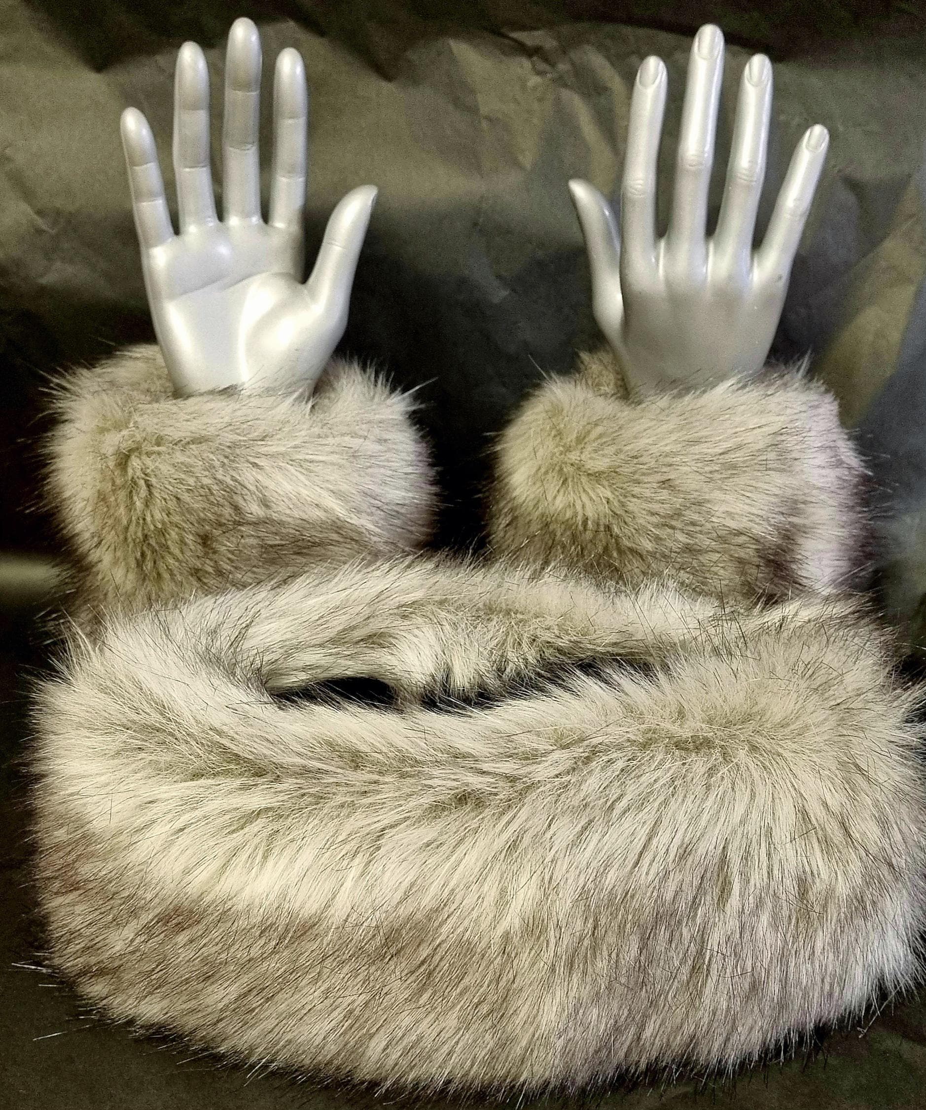 grey wrsist warmers with matching headband in a soft pile faux fur fabric
