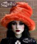Oversized orange faux fur hat with tall crown, handmade in the UK, shown from the front