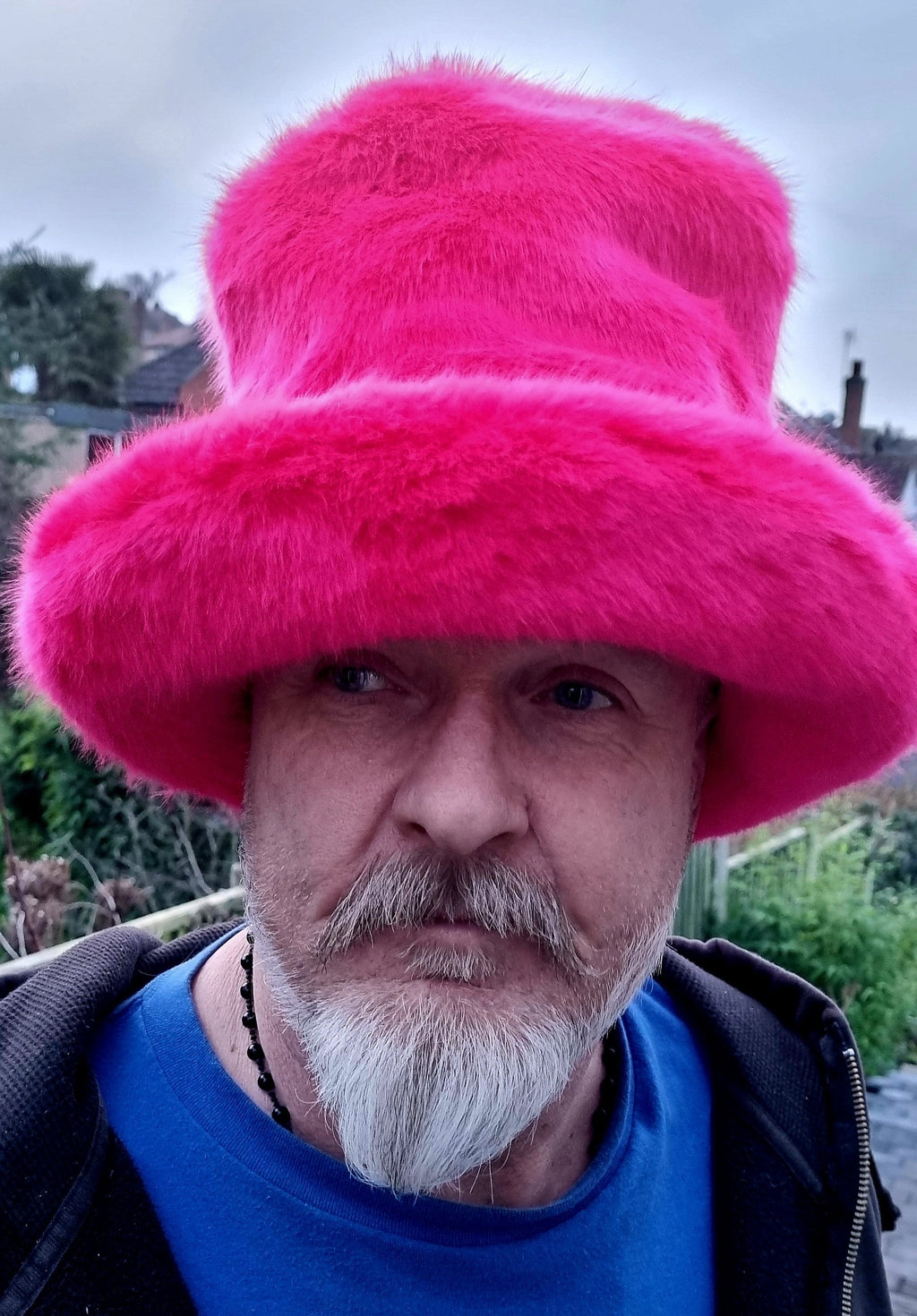 bright pink tall hat, in soft faux fur faric