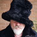 a great hat for all you JK fans! Tall 7 inch hat in black faux fur with a 3 inch brim