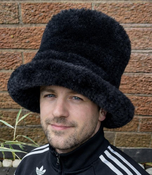 a large oversized black hat 6 inch tall ith a brim of 3.5 inches. Ideal for JK fans and Space Cwboys