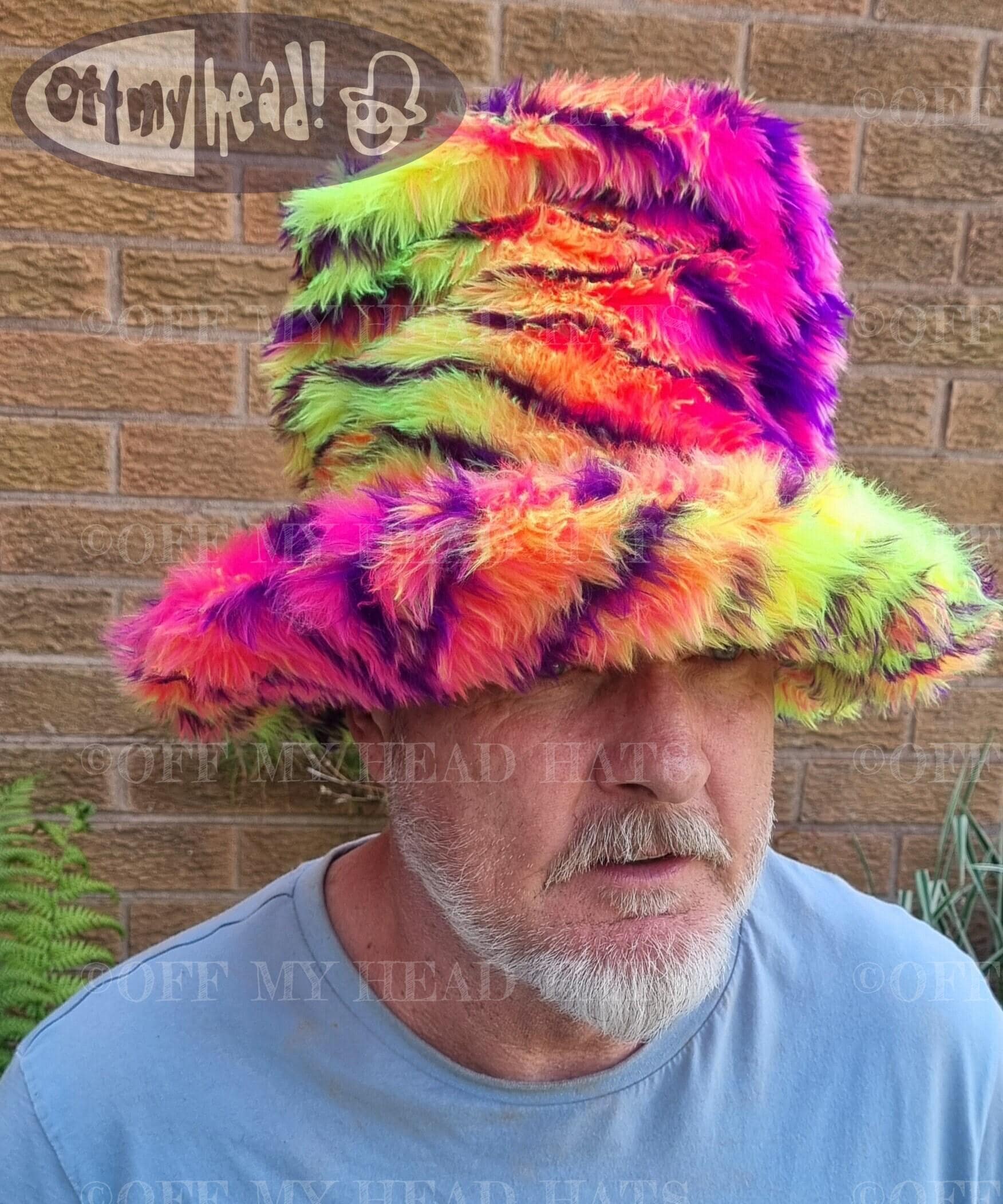 Side view of tall faux fur festival hat with fleece lining, made to order. Jamiroquai style large oversized top hat