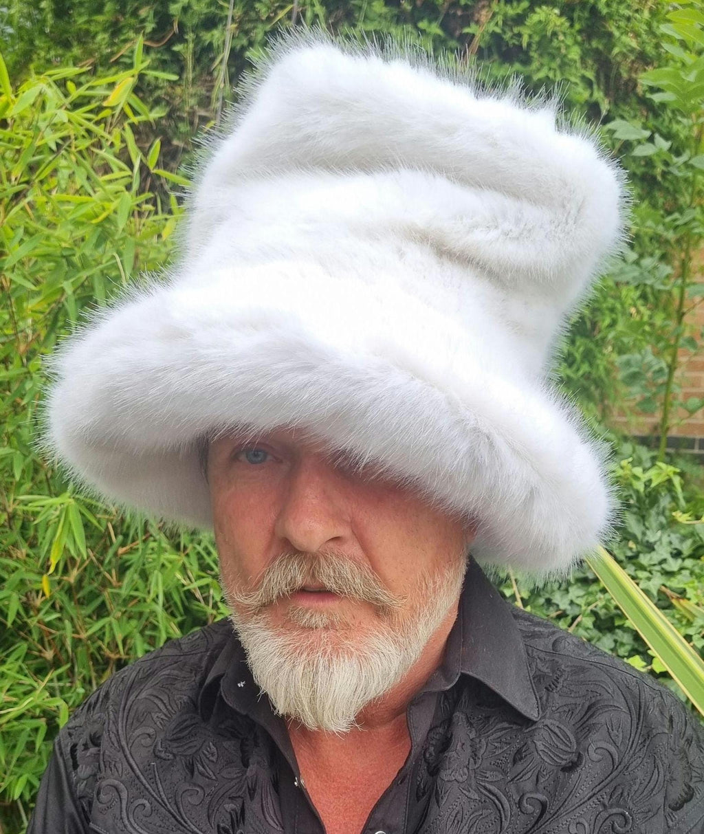 Tall white luxury faux fur hat with sculptural crown, handmade in the UK, front view