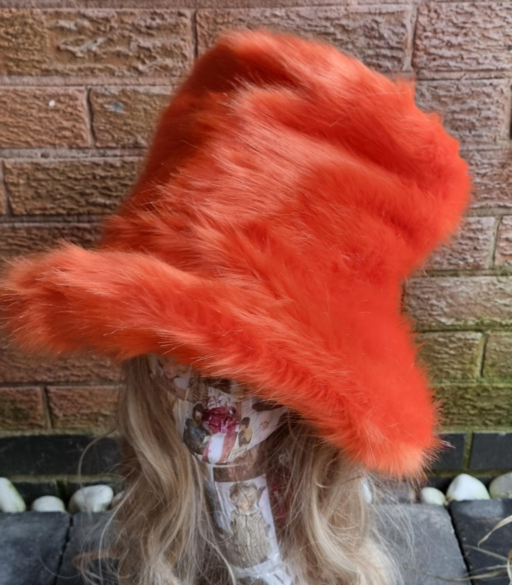 Orange faux fur hat styled flat on top, ideal for cosplay and street fashion