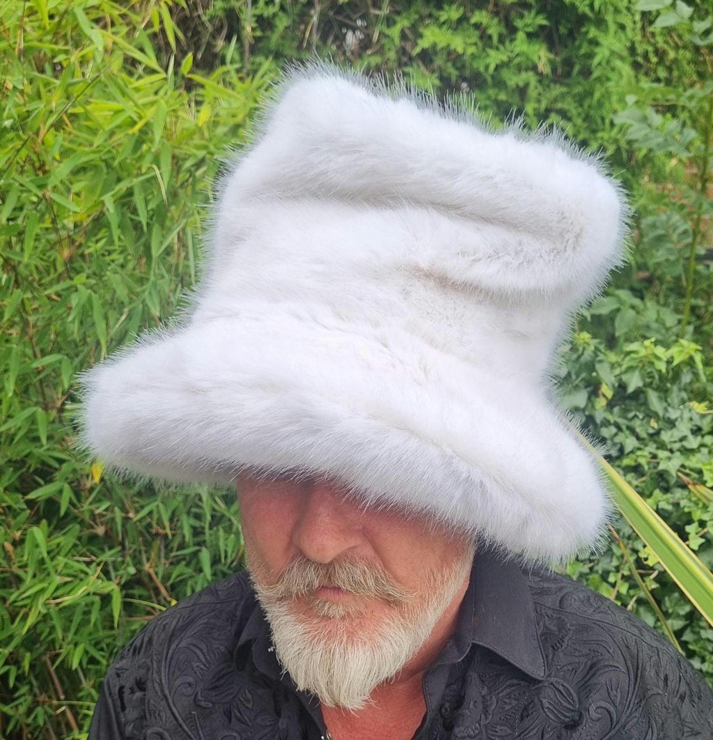 White faux fur tall hat with wide brim worn up, perfect for weddings and festivals