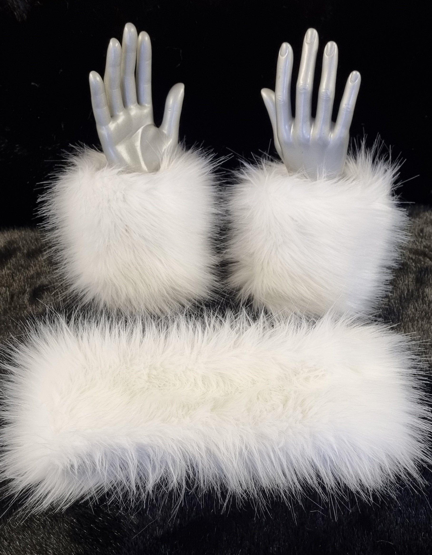 a gorgeous set of headband and fluffy cuffs in white faux fr